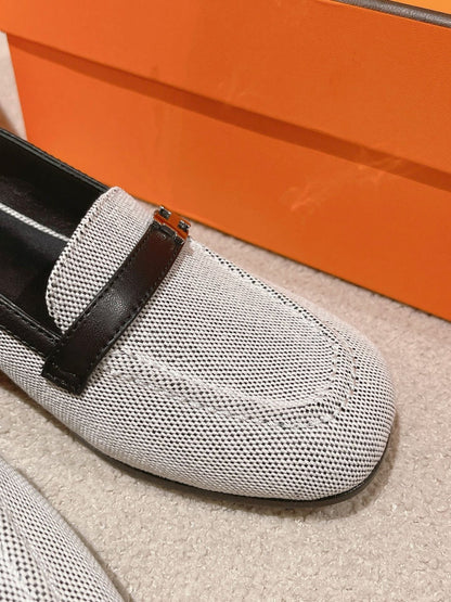 INFINIE 50 PUMP BLACK AND WHITE LAMBSKIN