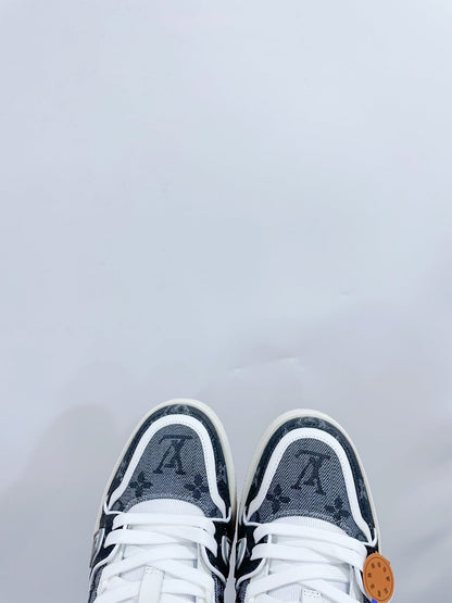 LV TRAINER SNEAKER IN DOVE GRAY MONOGRAM DENIM