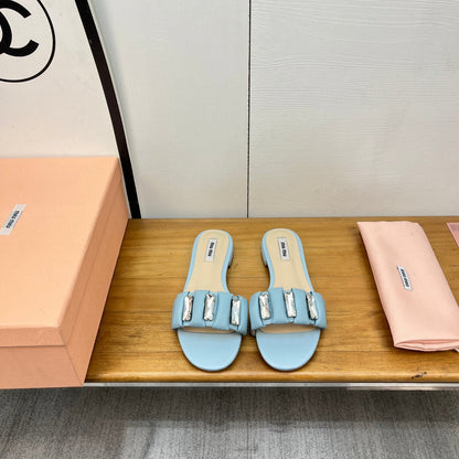 FLAT SLIDE IN LIGHT BLUE CALFSKIN