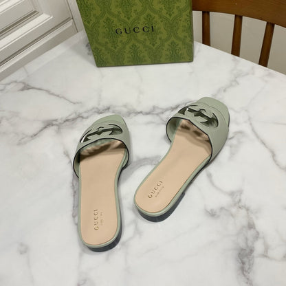 INTERLOCKING G SLIDE SANDAL IN PASTEL GREEN AND BEIGE CALFSKIN