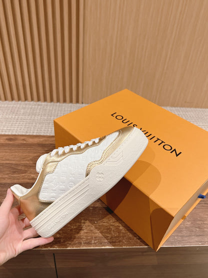 LV TRAINER SNEAKER IN GOLD MIX WHITE EMBOSSED CALFSKIN