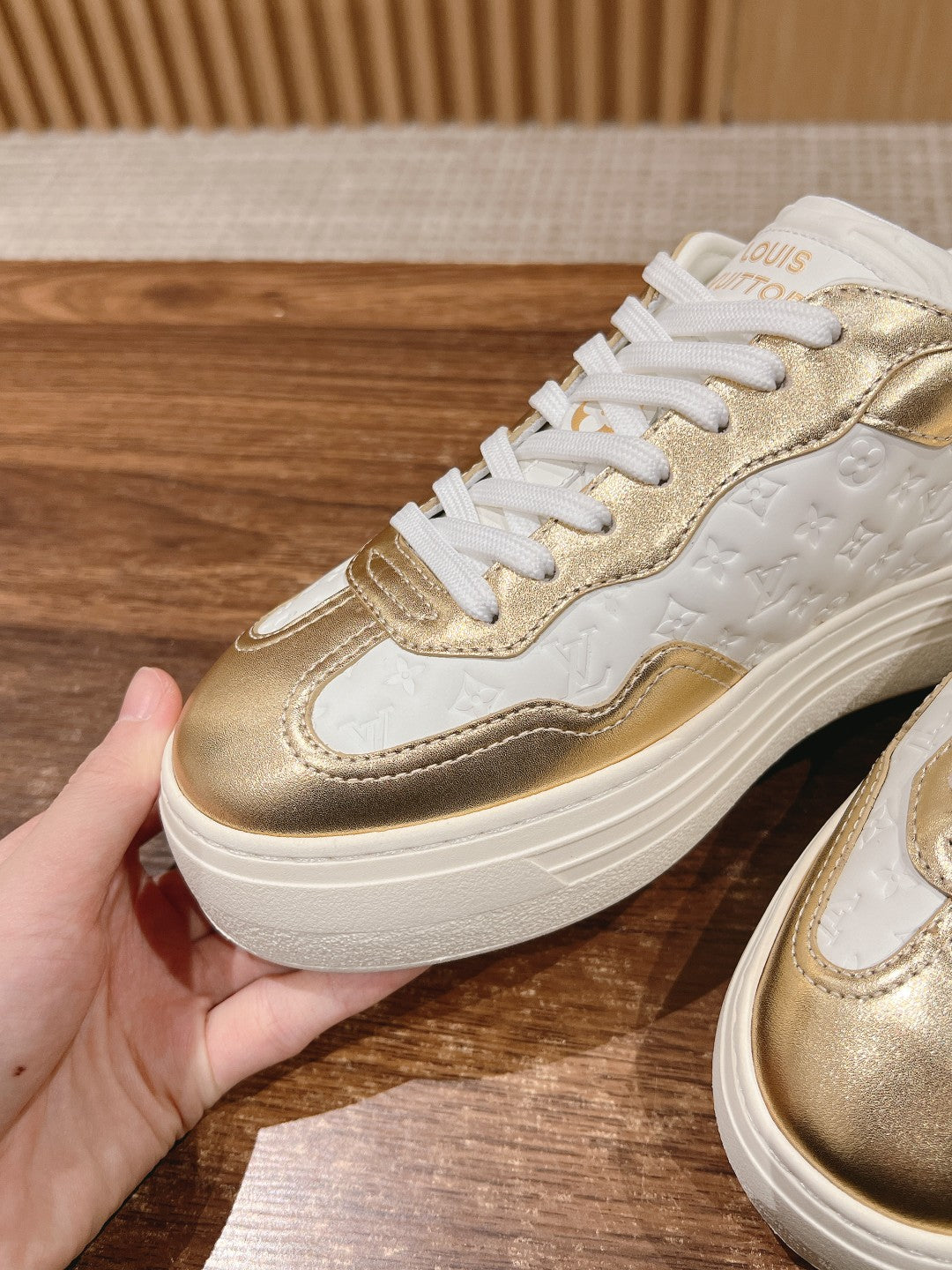 LV TRAINER SNEAKER IN GOLD MIX WHITE EMBOSSED CALFSKIN