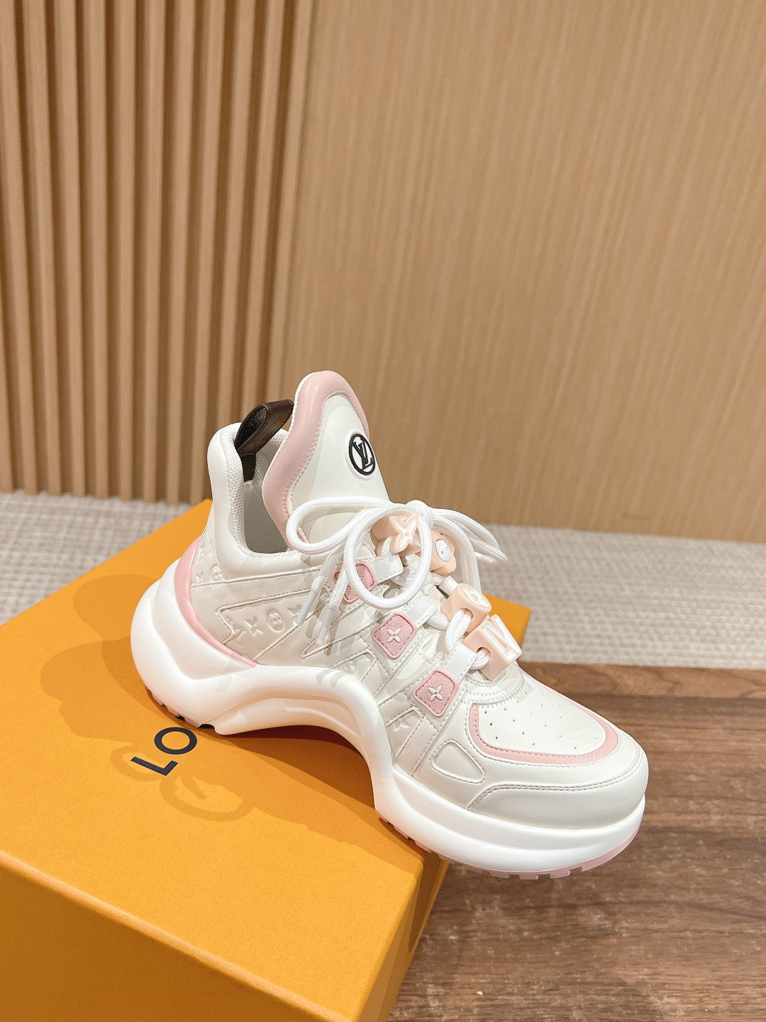 LV ARCHLIGHT SNEAKER IN WHITE MIX LIGHT PINK EMBOSSED CALFSKIN