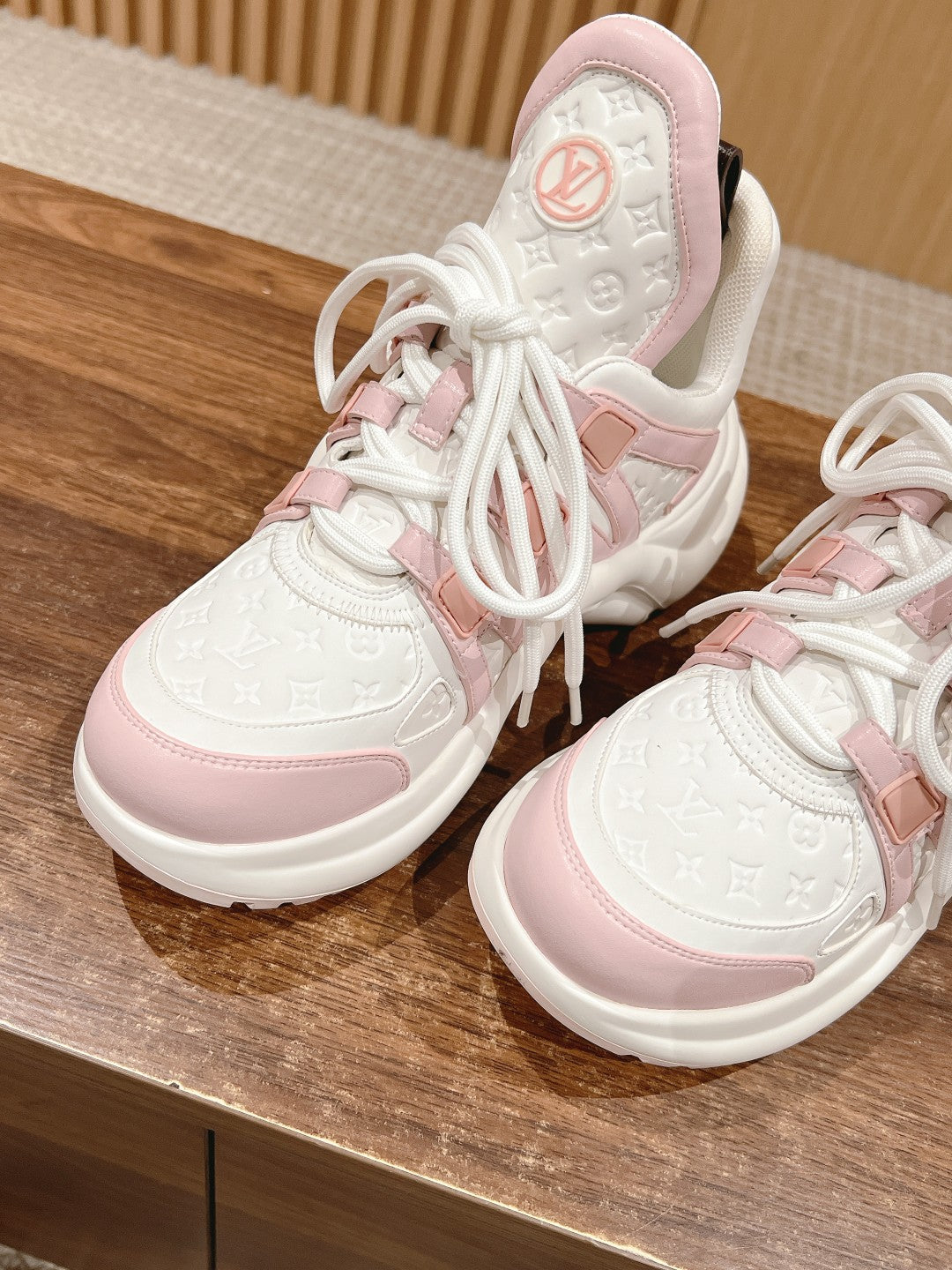 LV ARCHLIGHT SNEAKER IN WHITE MIX BABY PINK EMBOSSED CALFSKIN