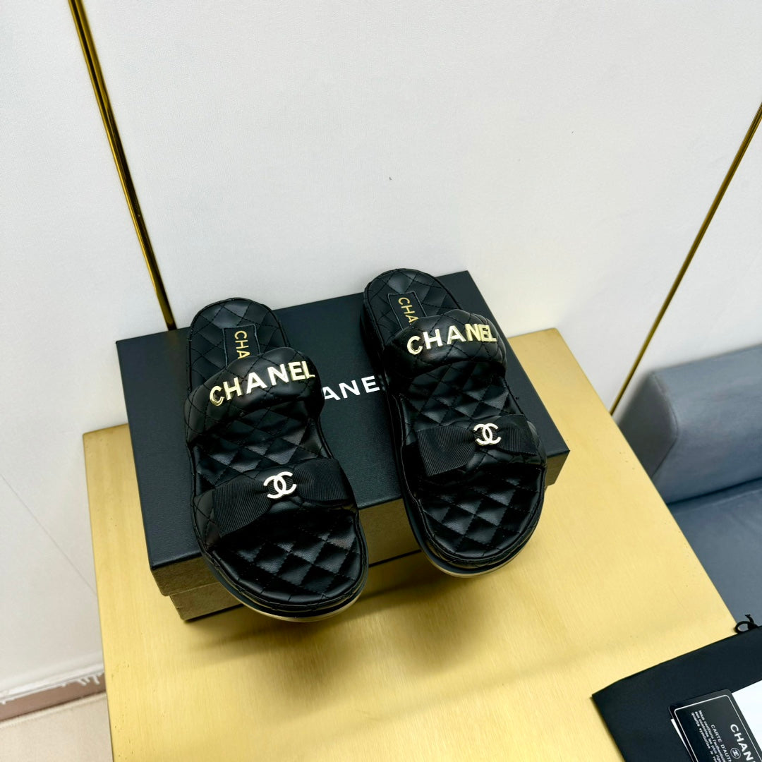 DAD SANDALS WITH BOW IN BLACK LAMBSKIN MULE