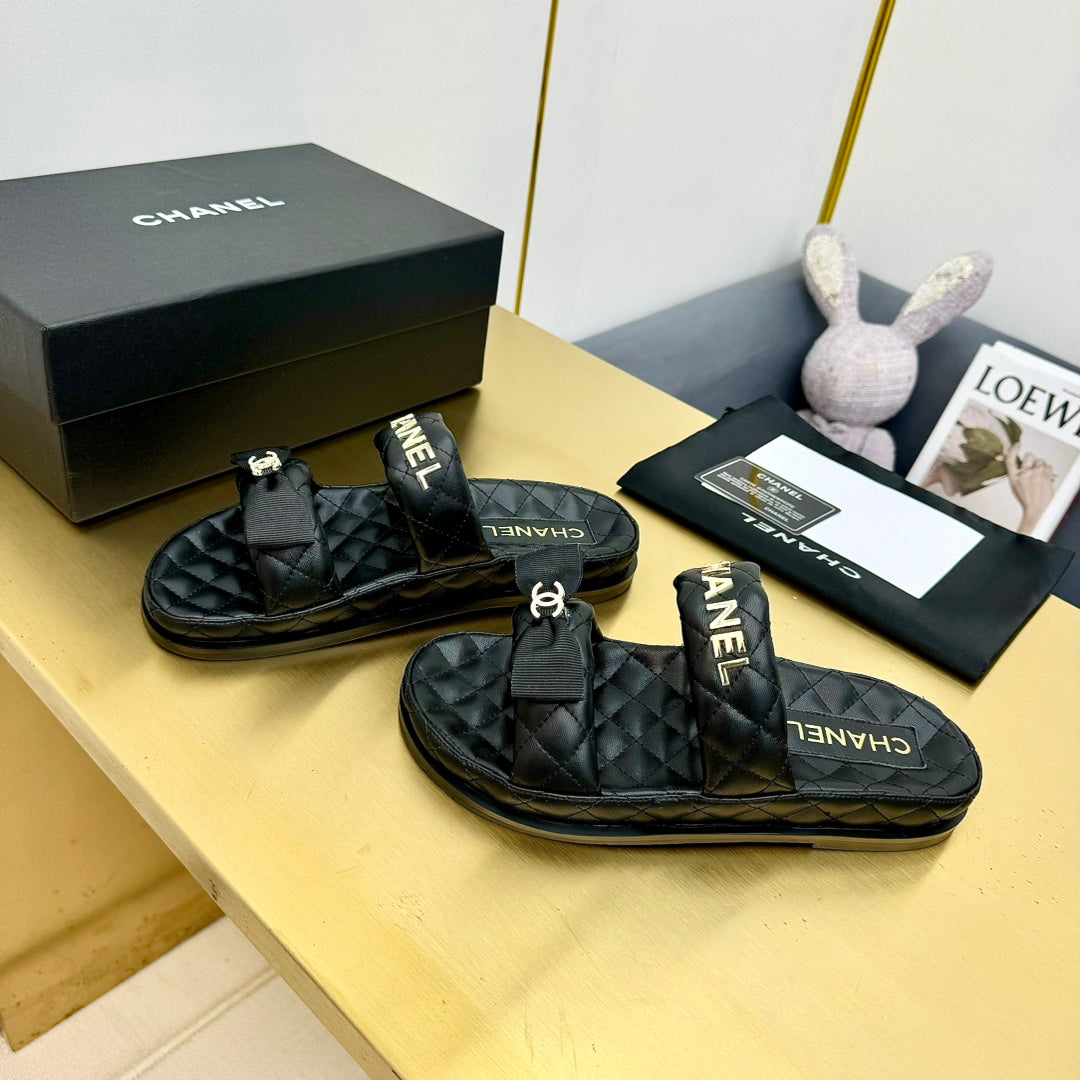DAD SANDALS WITH BOW IN BLACK LAMBSKIN MULE