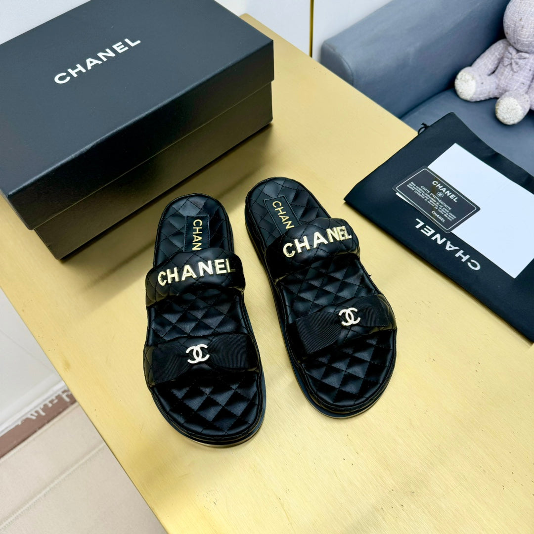 DAD SANDALS WITH BOW IN BLACK LAMBSKIN MULE