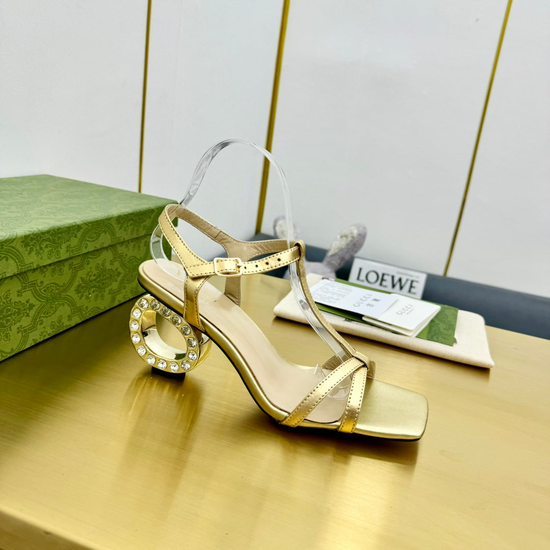 MEDIUM-HEEL SANDAL IN GOLD CALFSKIN GOLD HARDWARE WITH RHINSTONES