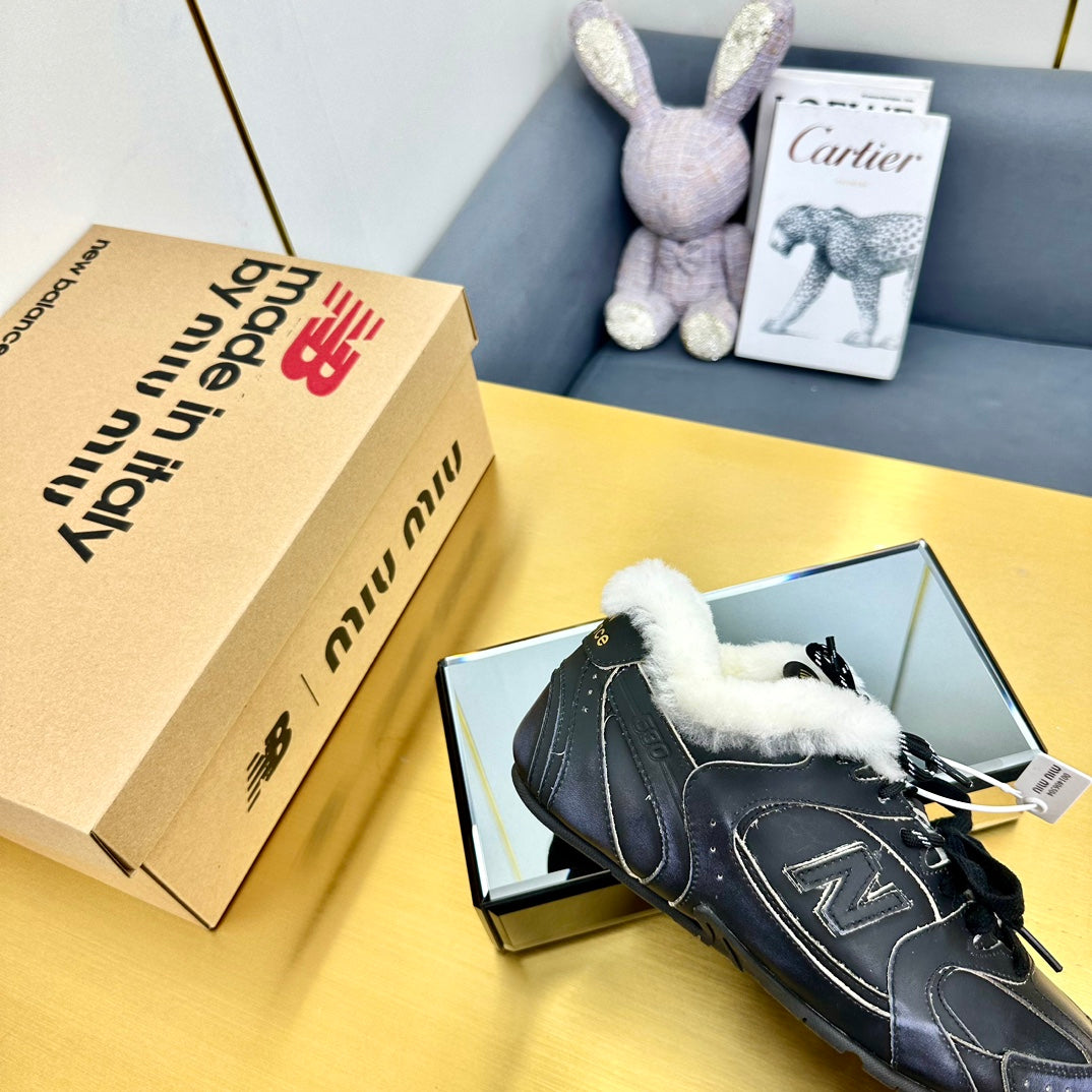 MIUXNB 530 SNEAKERS IN BLACK CALFSKIN SHEARLING