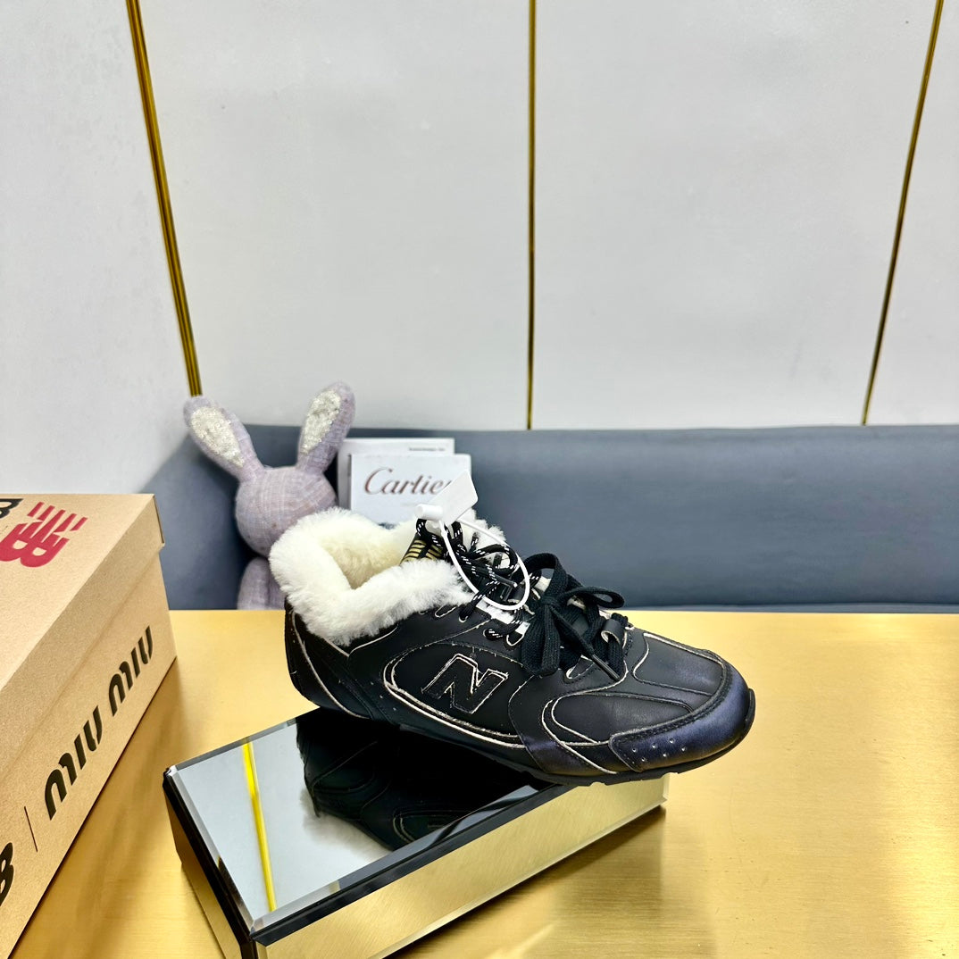 MIUXNB 530 SNEAKERS IN BLACK CALFSKIN SHEARLING