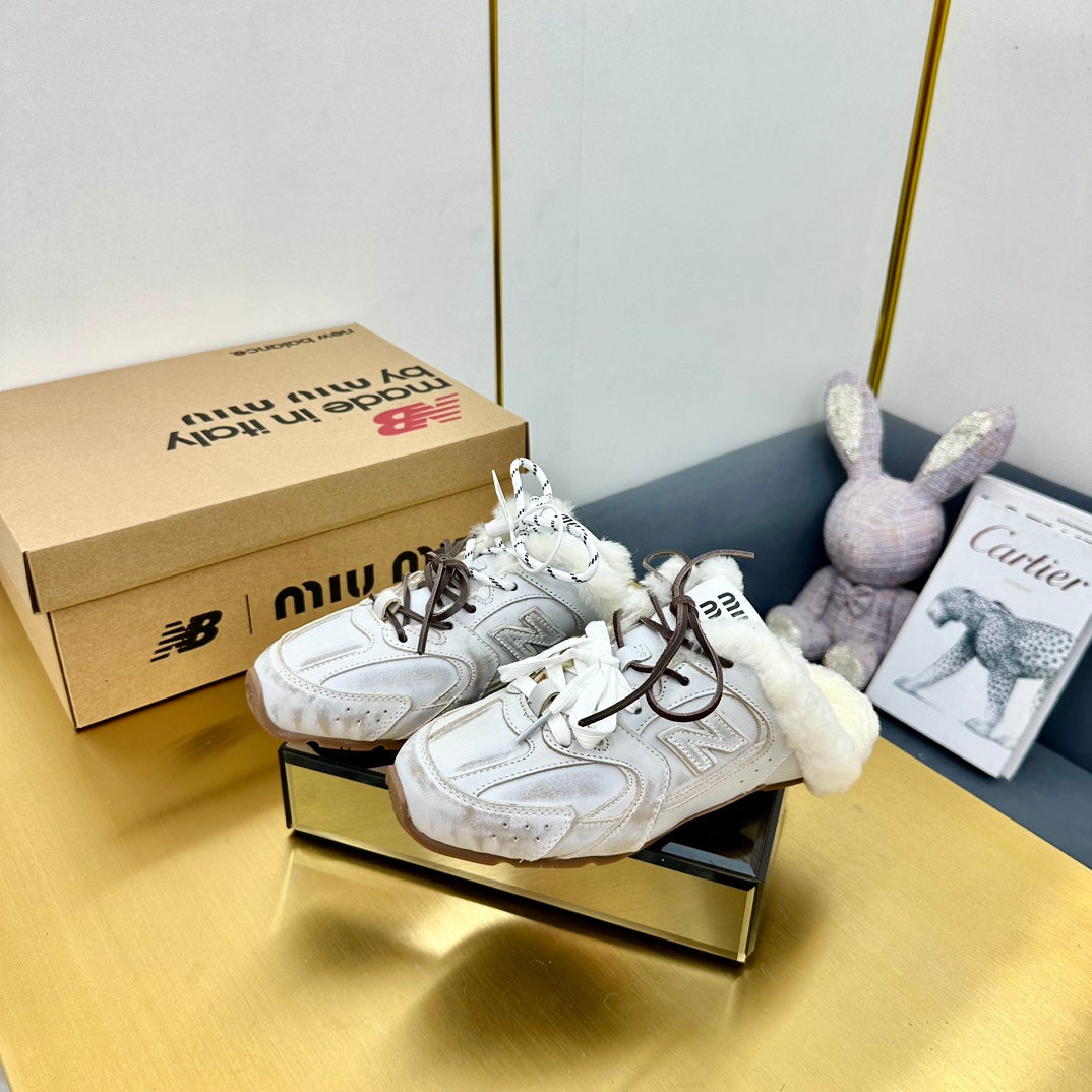 MIUxNB 530 SNEAKER MULES IN DISTRESSED WHITE CALFSKIN SHEARLING