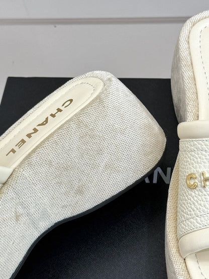 PLATFORM SLIPPERS IN WHITE LAMBSKIN