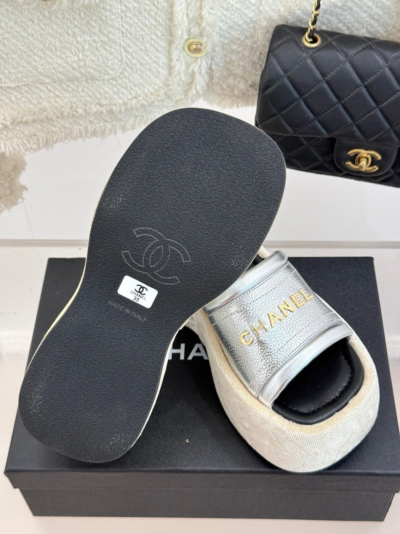 PLATFORM SLIPPERS IN SILVER LAMBSKIN