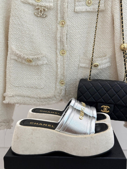 PLATFORM SLIPPERS IN SILVER LAMBSKIN