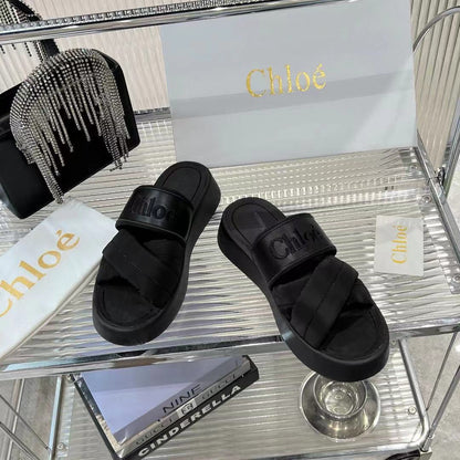 MILA FLAT SLIDES 5 CM IN BLACK CALFSKIN AND RE-NYLON