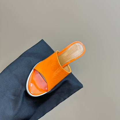 HIGH MULE 95 MM IN VIVID ORANGE CALFSKIN