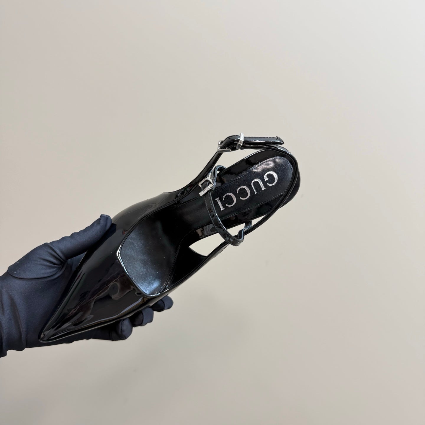 POINTED-TOE HIGH BAMBOO-EFFECT HEEL SLINGBACK IN BLACK PATENT CALFSKIN