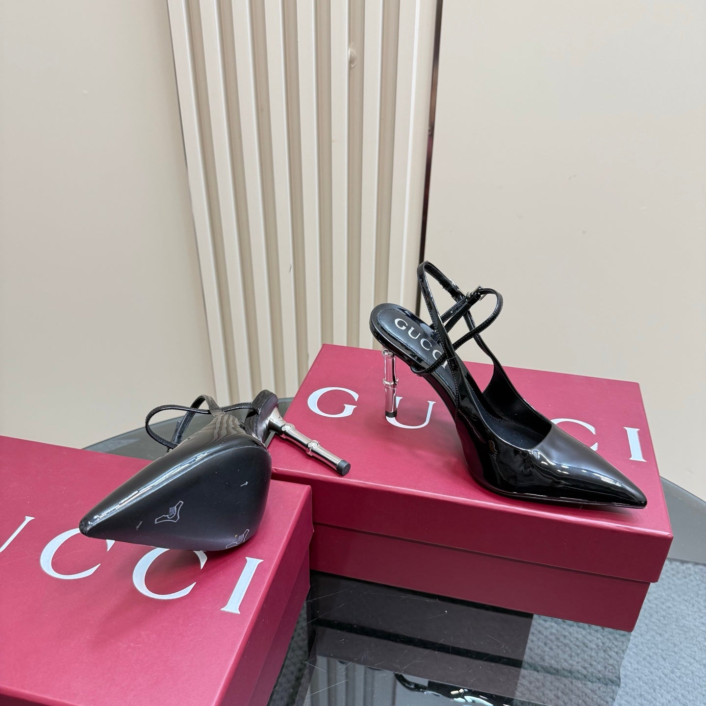 POINTED-TOE HIGH BAMBOO-EFFECT HEEL SLINGBACK IN BLACK PATENT CALFSKIN