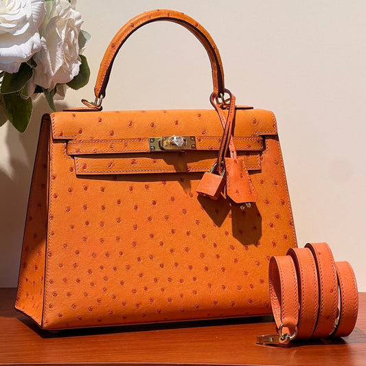 KELLY SELLIER 25 BAG IN FIRE ORANGE OSTRICH LEATHER WITH GOLD HARDWARE