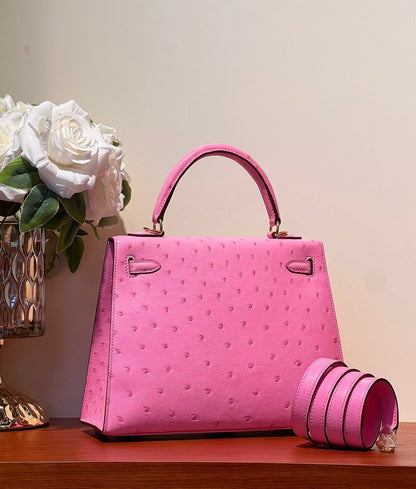 KELLY SELLIER 25 BAG IN DOLL PINK OSTRICH LEATHER WITH GOLD HARDWARE