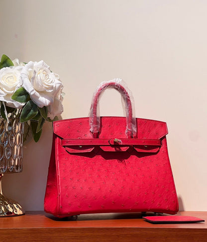 KELLY SELLIER 25 BAG IN CLASSIC RED OSTRICH LEATHER WITH GOLD HARDWARE