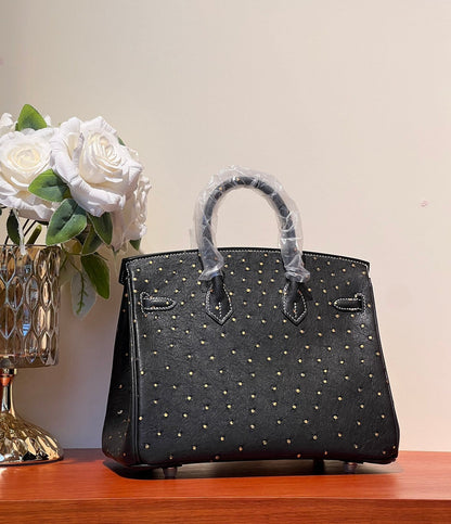 KELLY SELLIER 25 BAG IN BLACK OSTRICH LEATHER WITH GOLD RHINSTONES
