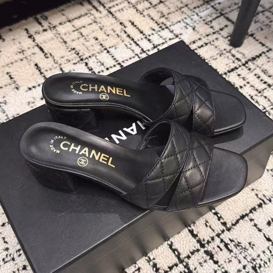 MID HEEL MULES IN BLACK SHEEPSKIN