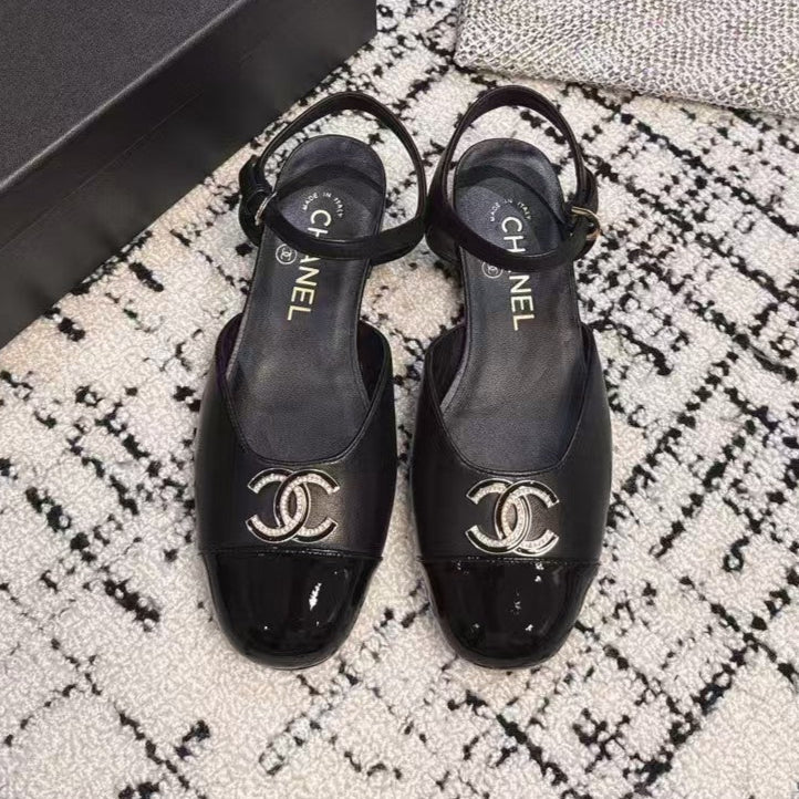 FLAT SLINGBACKS IN BLACK CALFSKIN