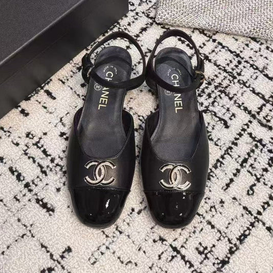 FLAT SLINGBACKS IN BLACK CALFSKIN