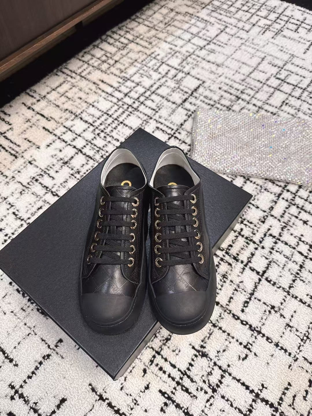 BISCUIT SNEAKERS IN BLACK CALFSKIN