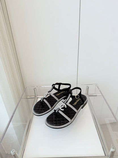 FLAT SANDALS IN BLACK SOFT LEATHER WITH SILVER STONE