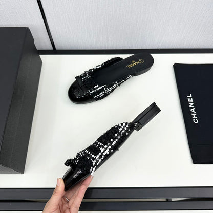 BOW MULE IN BLACK MIX WHITE FUR AND CALFSKIN