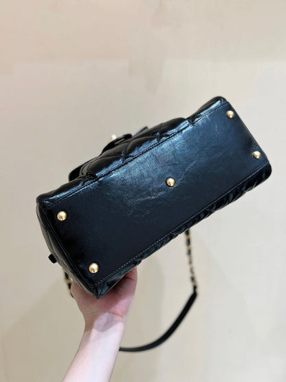 QUILTED BOWLING BAG 33 IN BLACK LAMBSKIN GOLD HARDWARE