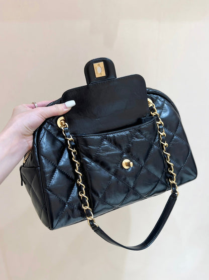 QUILTED BOWLING BAG 33 IN BLACK LAMBSKIN GOLD HARDWARE