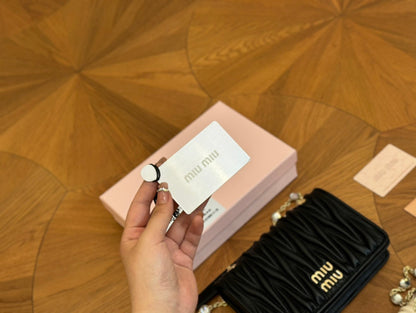 CRYSTAL CLOQUÉ 20 NAPPA BLACK LEATHER BAG