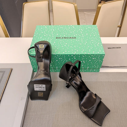 OPEN-TOE CURVED HIGH HEEL SANDALS IN BLACK SMOOTH CALFSKIN