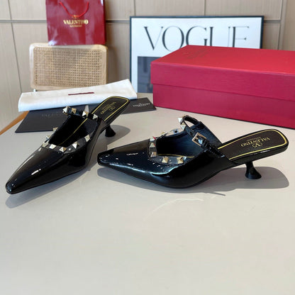 ROCKSTUD CAGED MULES 5 CM IN BLACK CALFSKIN