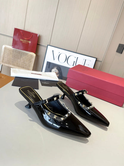 ROCKSTUD CAGED MULES 5 CM IN BLACK CALFSKIN