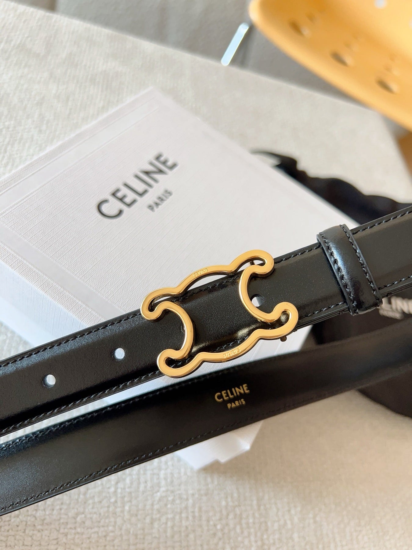 BELT 25MM TRIOMPHE LOGO CUT-OUT IN SMOOTH BLACK CALFSKIN WITH GOLD BUCKLE