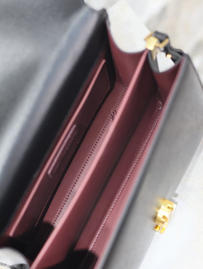 CASSANDRA TOP HANDLE BAG 24 IN BLACK CALFSKIN GOLD HARDWARE