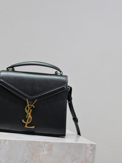 CASSANDRA MINI TOP HANDLE BAG 20 IN BLACK CALFSKIN GOLD HARDWARE