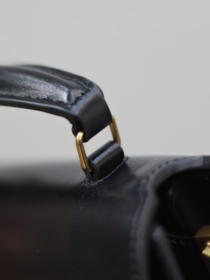 CASSANDRA MINI TOP HANDLE BAG 20 IN BLACK SMOOTH LAMBSKIN GOLD HARDWARE