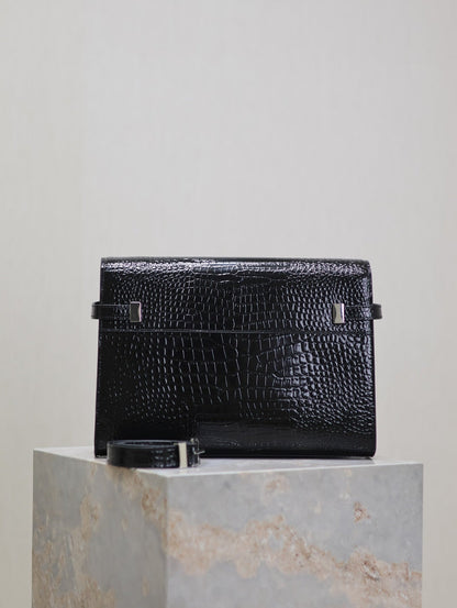 MANHATTAN MEDIUM 29 IN BLACK CROCODILE-EMBOSSED CALFSKIN SILVER BUCKLE