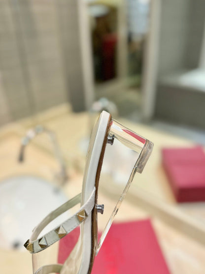 ROCKSTUD MULE SANDALS IN WHITE CALFSKIN AND TRANSPARENT PVC FILM