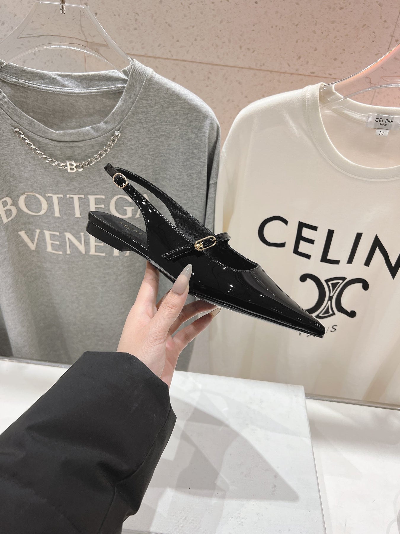 JUDY FLAT SLINGBACK IN BLACK PATENT CALFSKIN