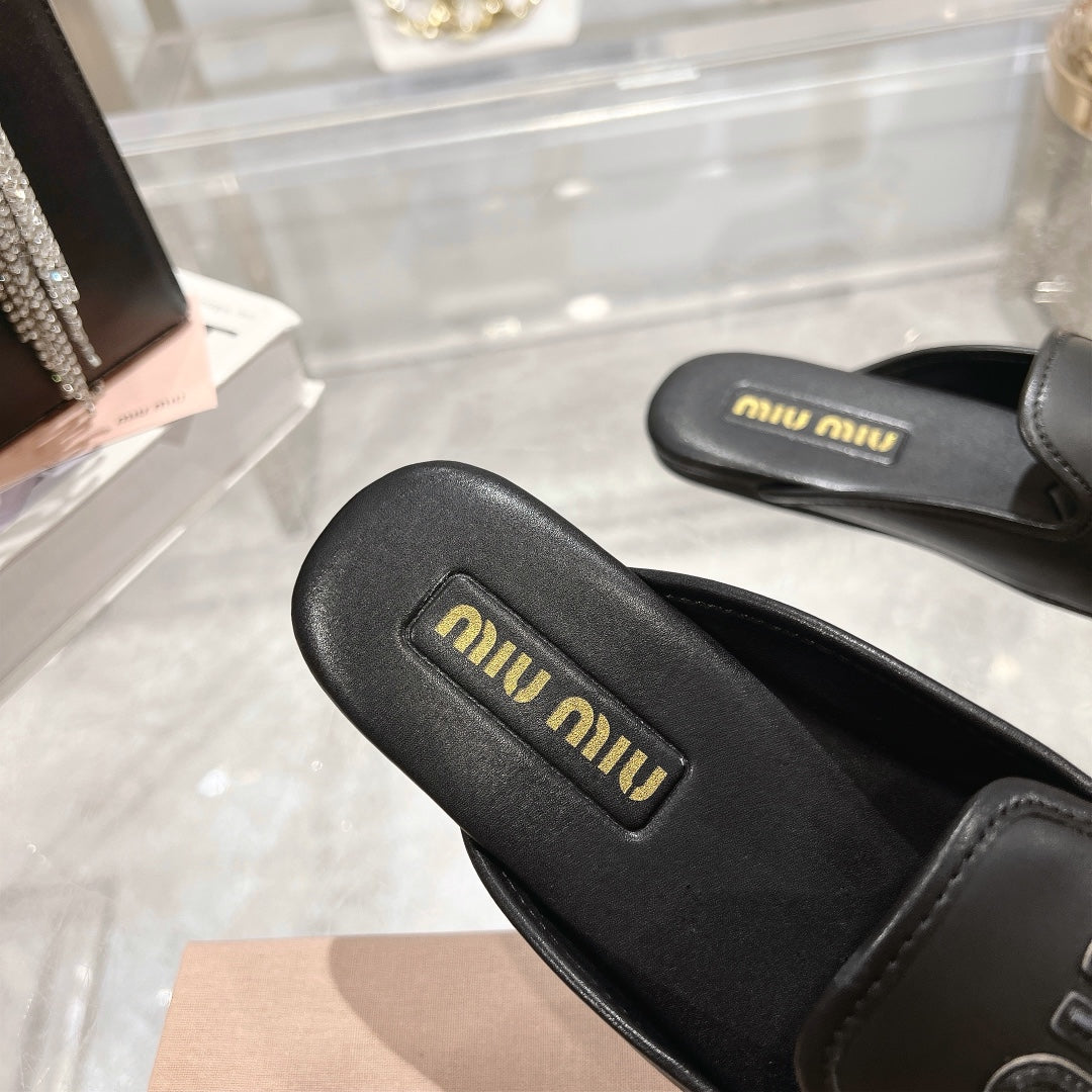 MULES SLIPPERS BLACK COWHIDE