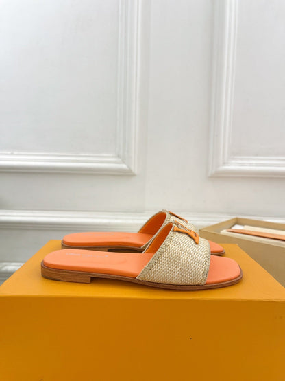 LV WOMEN CAPRI FLAT MULES IN TIGER ORANGE LEATHER AND RAFFIA
