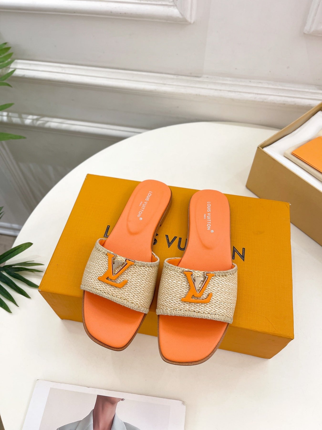 LV WOMEN CAPRI FLAT MULES IN TIGER ORANGE LEATHER AND RAFFIA