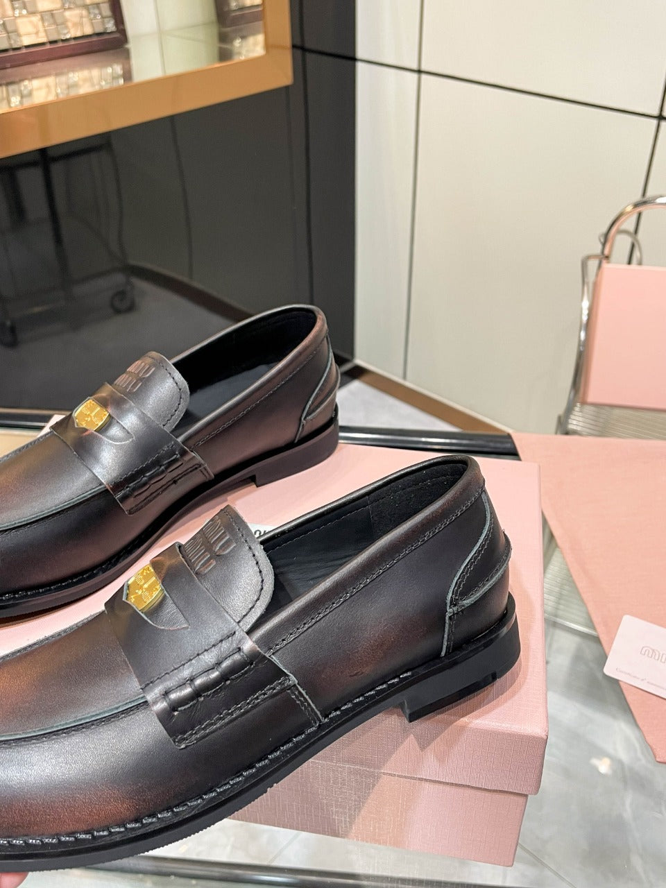 PENNY LOAFERS IN BLACK WITH A RED UNDERTONE CALFSKIN