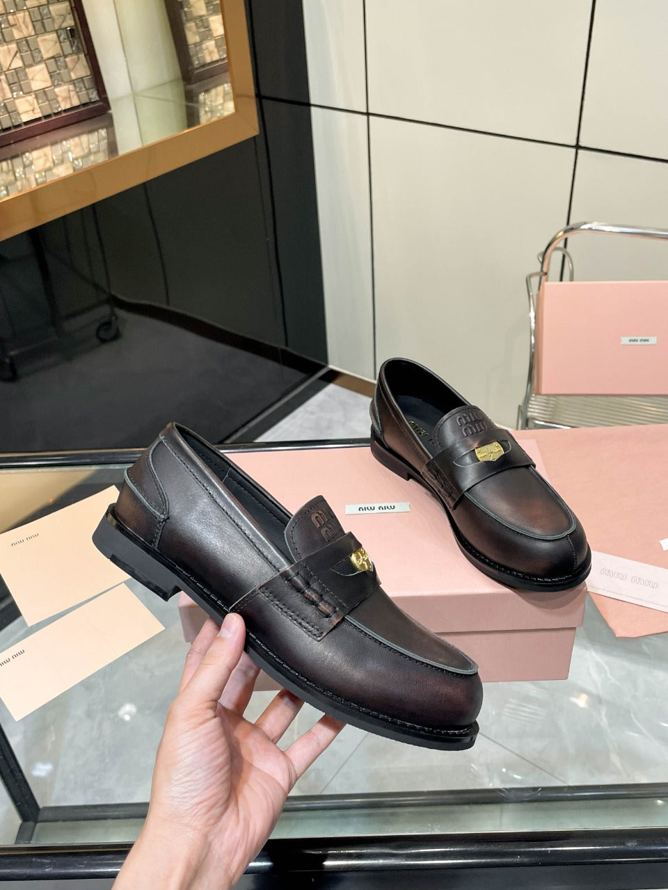 PENNY LOAFERS IN BLACK WITH A RED UNDERTONE CALFSKIN